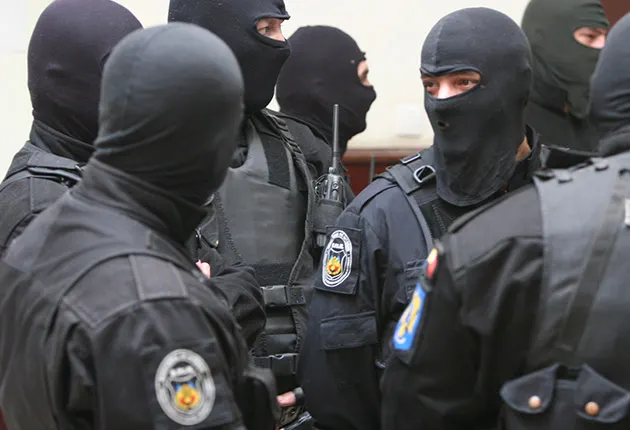 percheziții